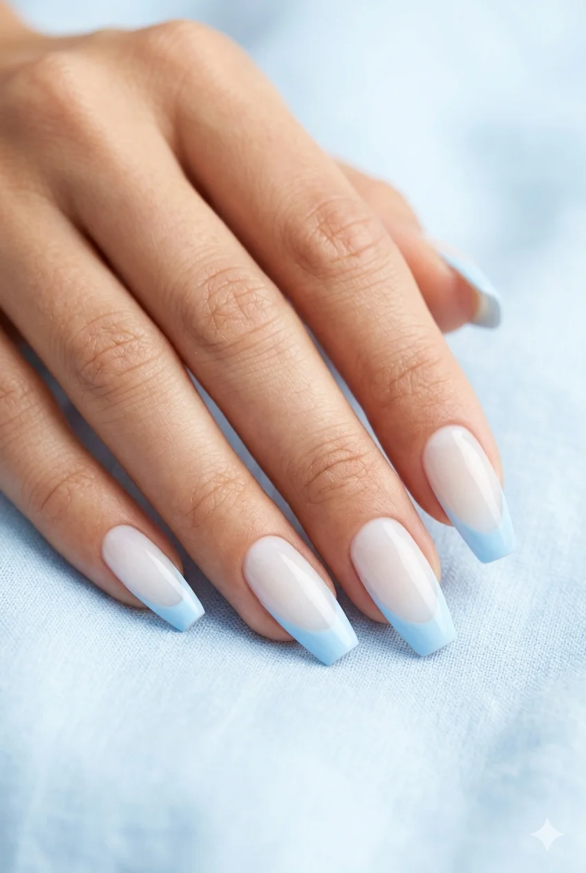 sky blue French tip coffin nails pastel blue sheer base playful modern manicure 2026