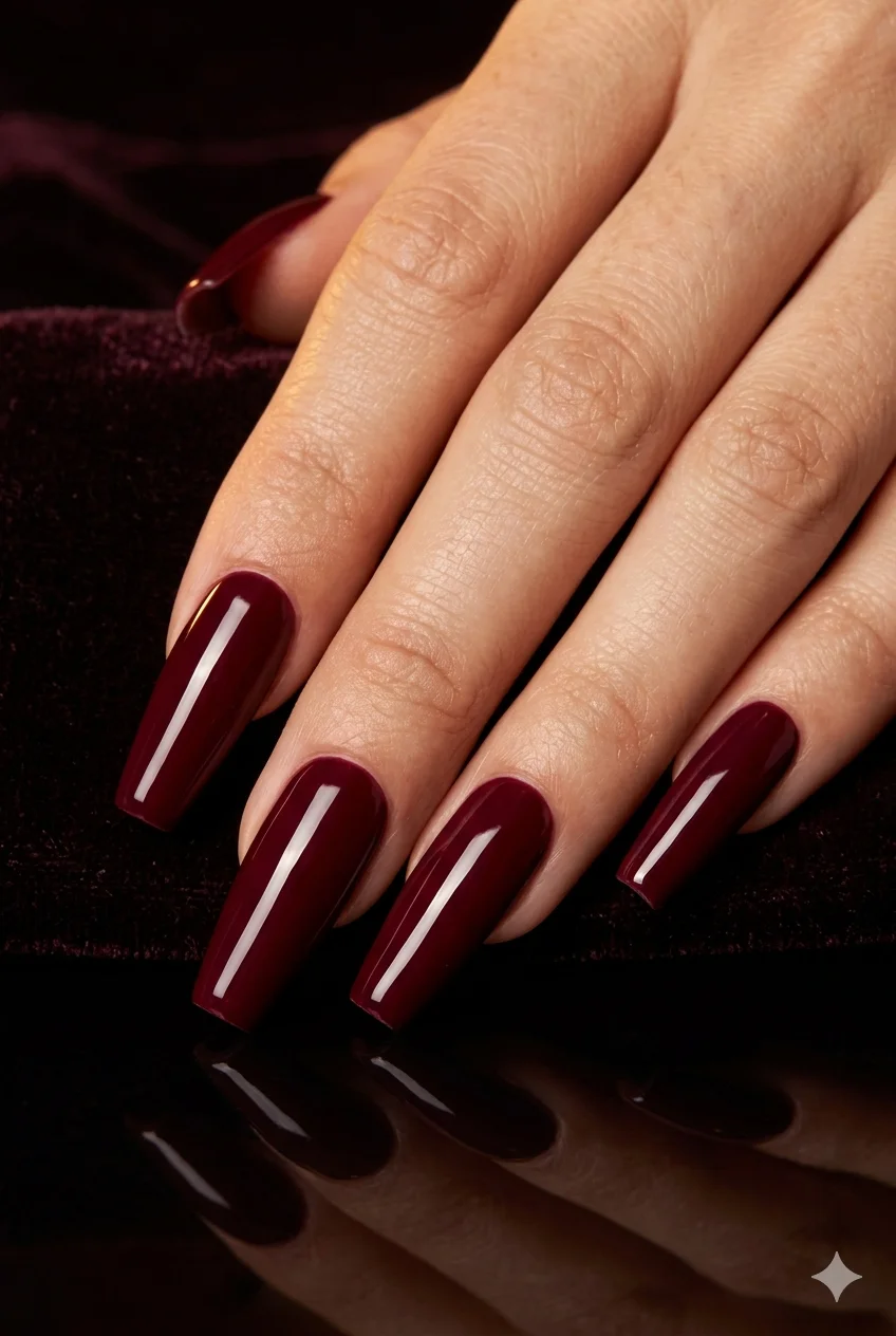 deep burgundy glossy coffin nails rich wine red ultra-gloss dramatic glamorous 2026