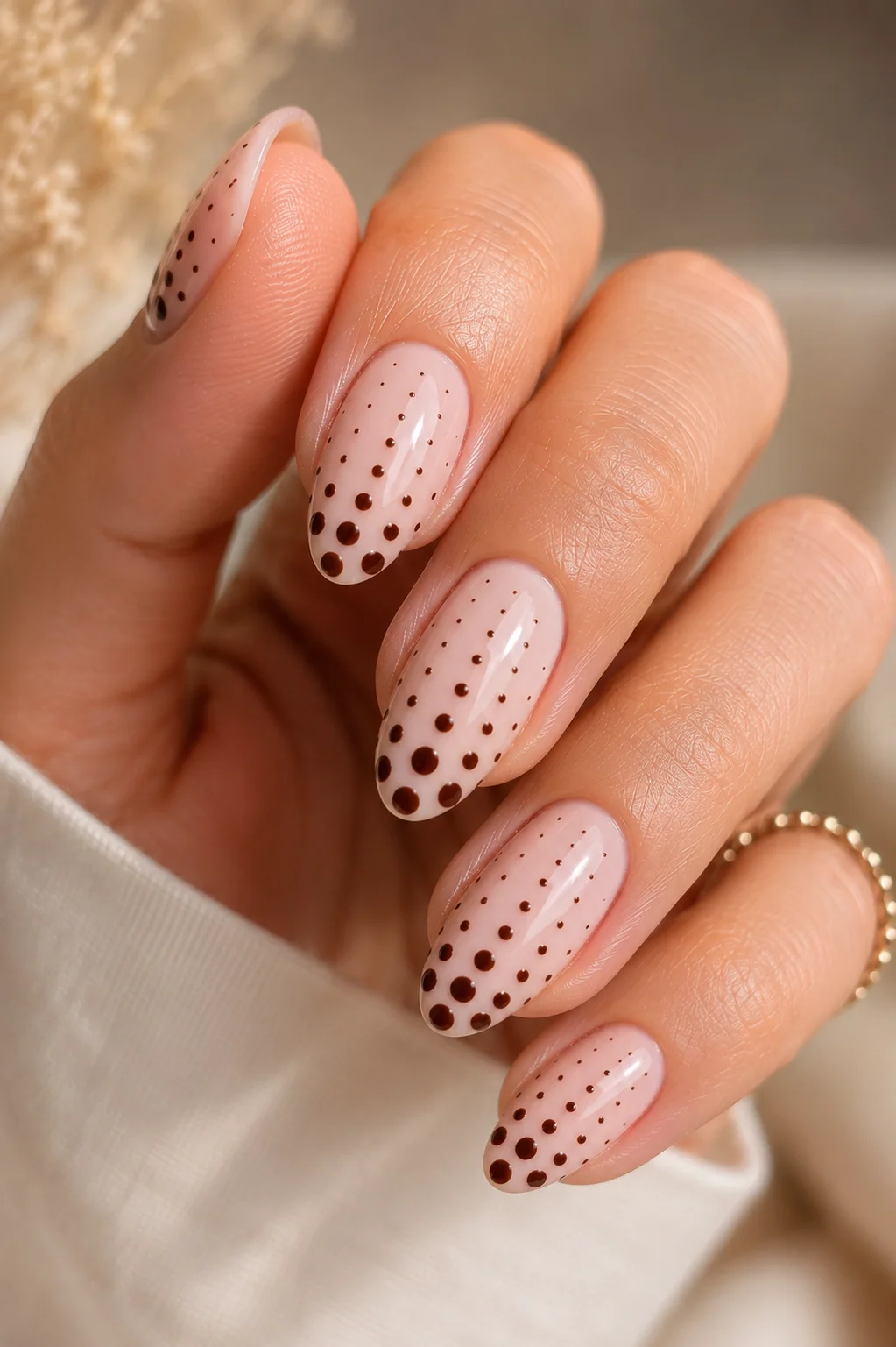 graduated size polka dot nails small dots at cuticle growing larger toward tip gradient effect 2026