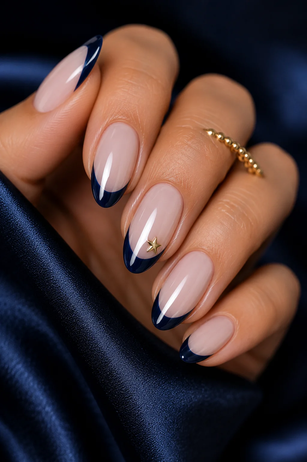 navy French tip patriotic nails deep midnight navy tip sheer nude base gold star accent fourth of July 2026