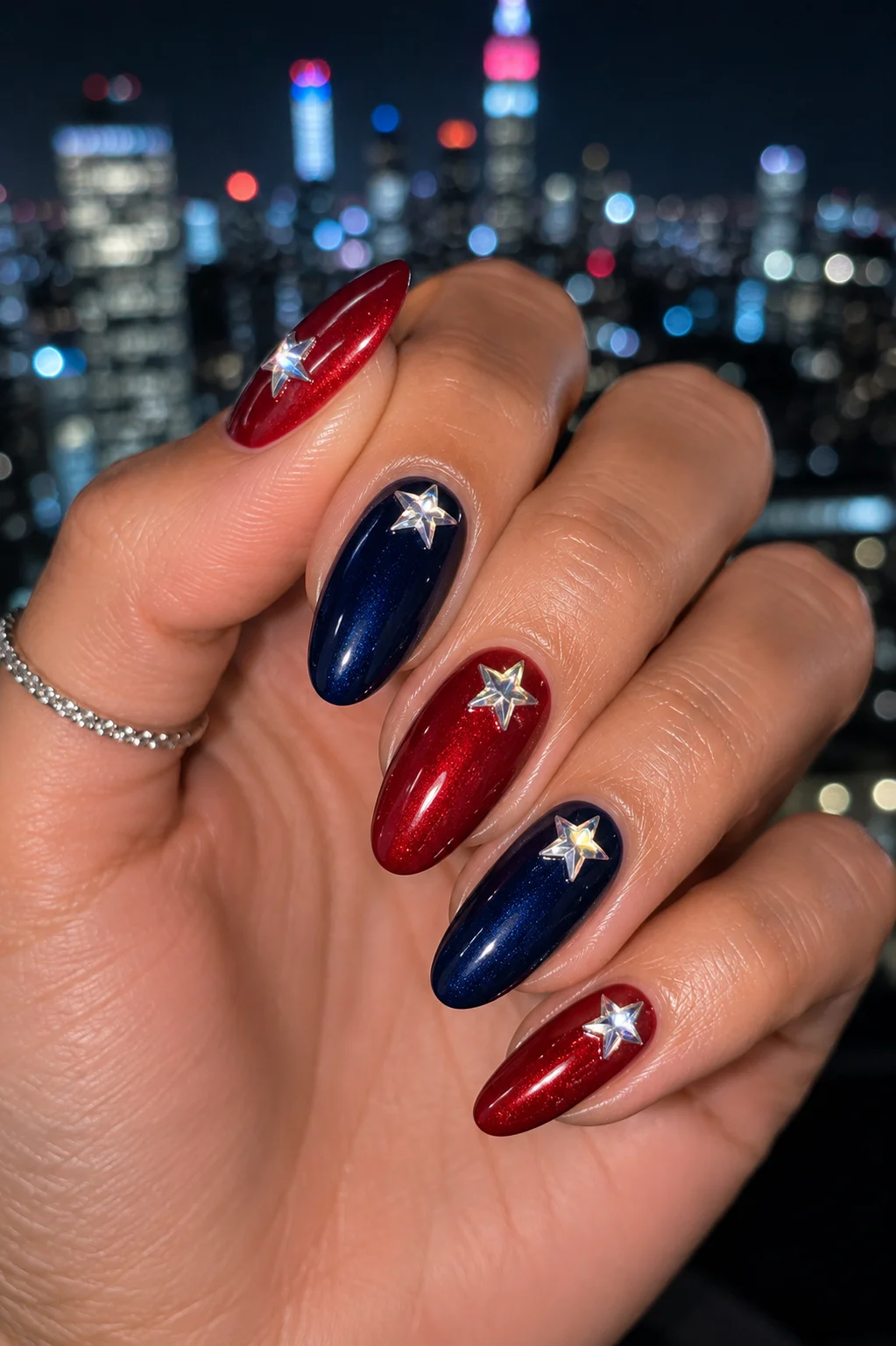rhinestone star 4th of July nails red navy alternating gel star-shaped crystal rhinestones cuticle line patriotic glam 2026