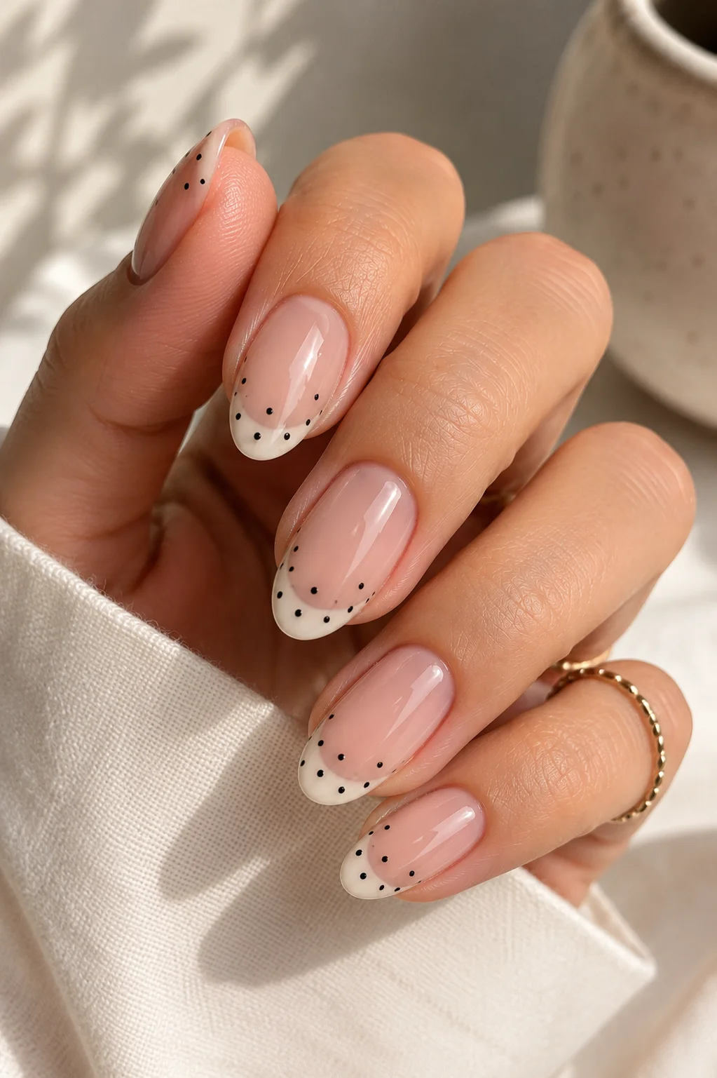 polka dot French tip hybrid nails nude base clean French tip black micro dots at tip line minimal 2026