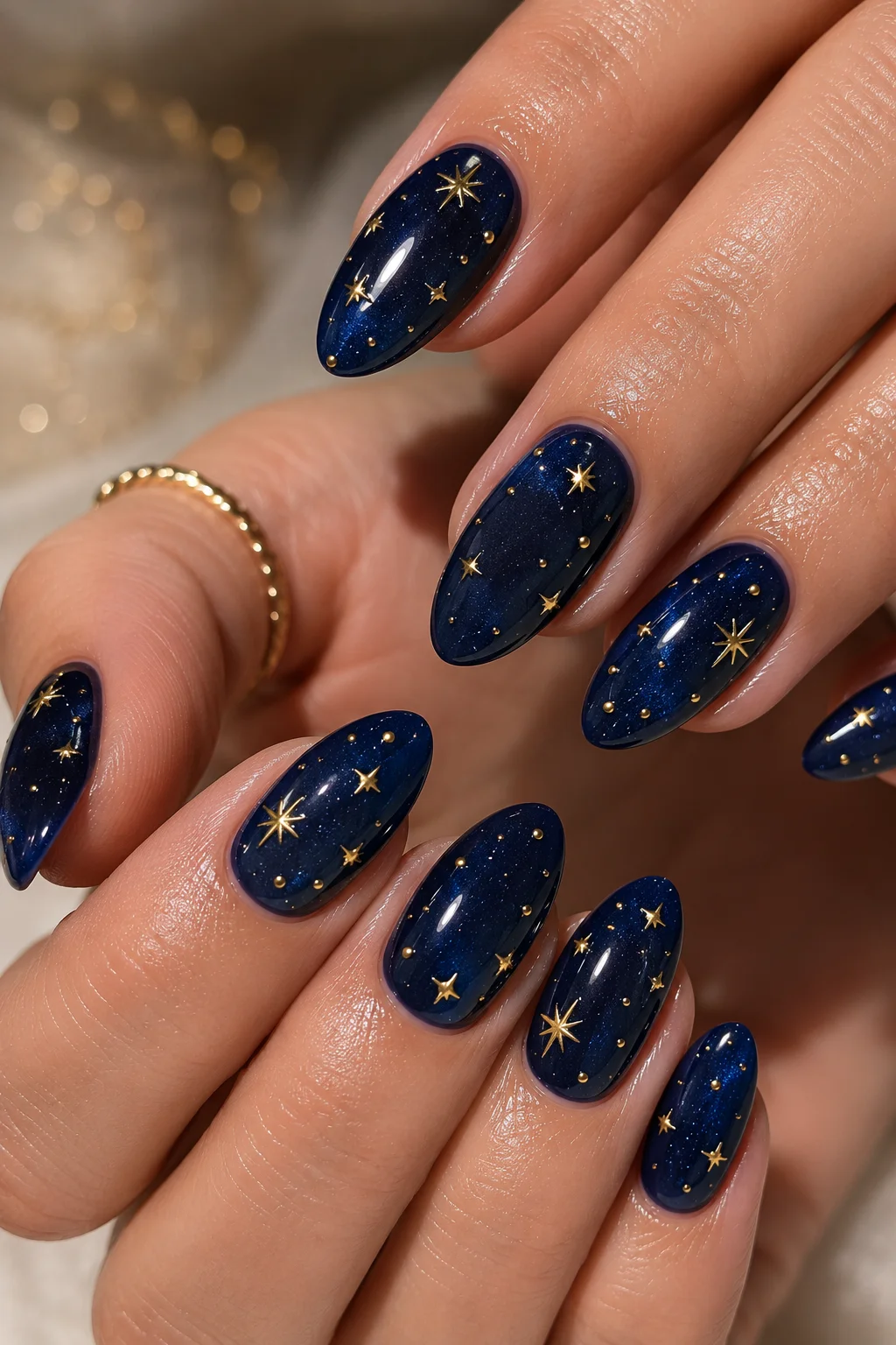 navy constellation star nails deep navy scattered gold stars varying sizes asymmetric patriotic celestial 2026